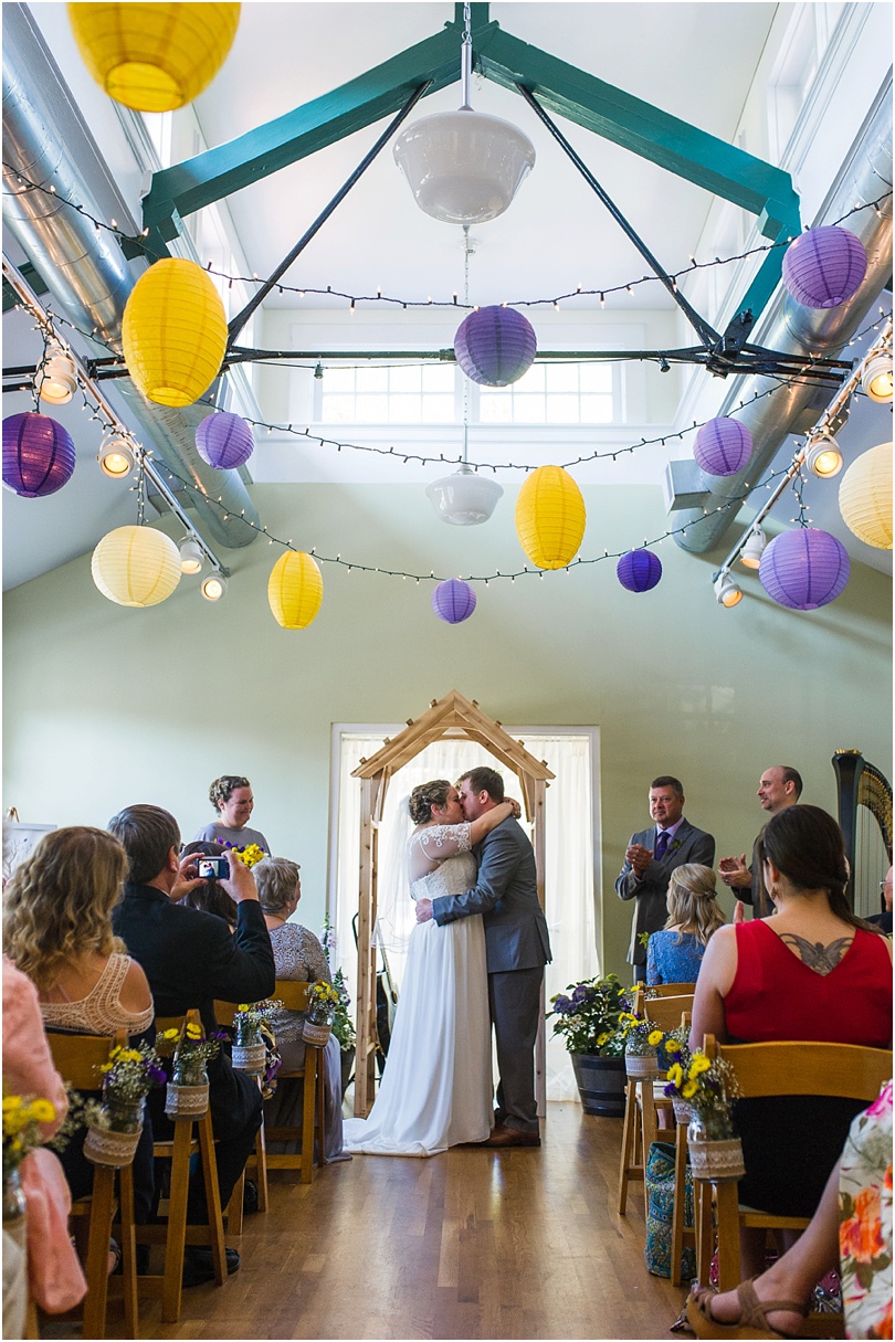 purple and yellow color themed wedding decor
