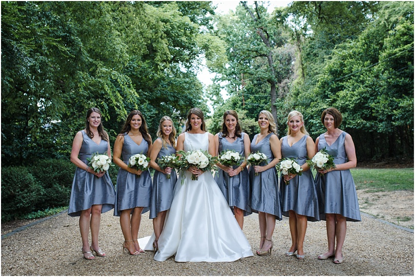 bridesmaids on the estate's pebble driveway creates a lovely walking path