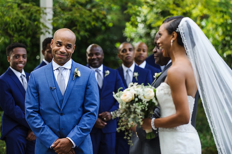 groom seeing his bride for the very first time